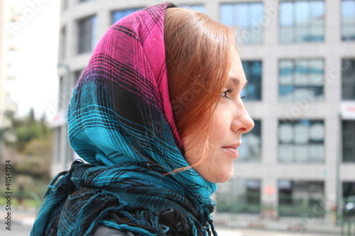 Pretty redhea woman with scarf photo