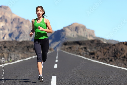 Obraz na plátně Runner woman running