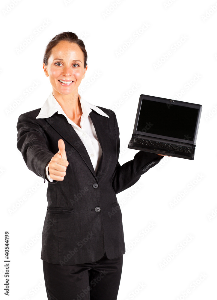 businesswoman holding laptop and giving thumb up businesswoman holding laptop and giving thumb up