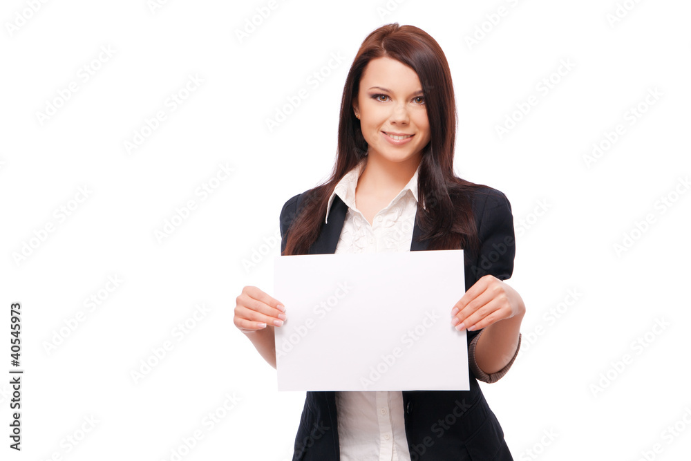 young woman in a jacket and blouse shows a white sheet, isolated young woman in a jacket and blouse shows a white sheet, isolated