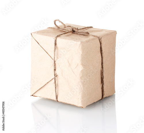 Small parcel wrapped in brown paper tied with twine isolated