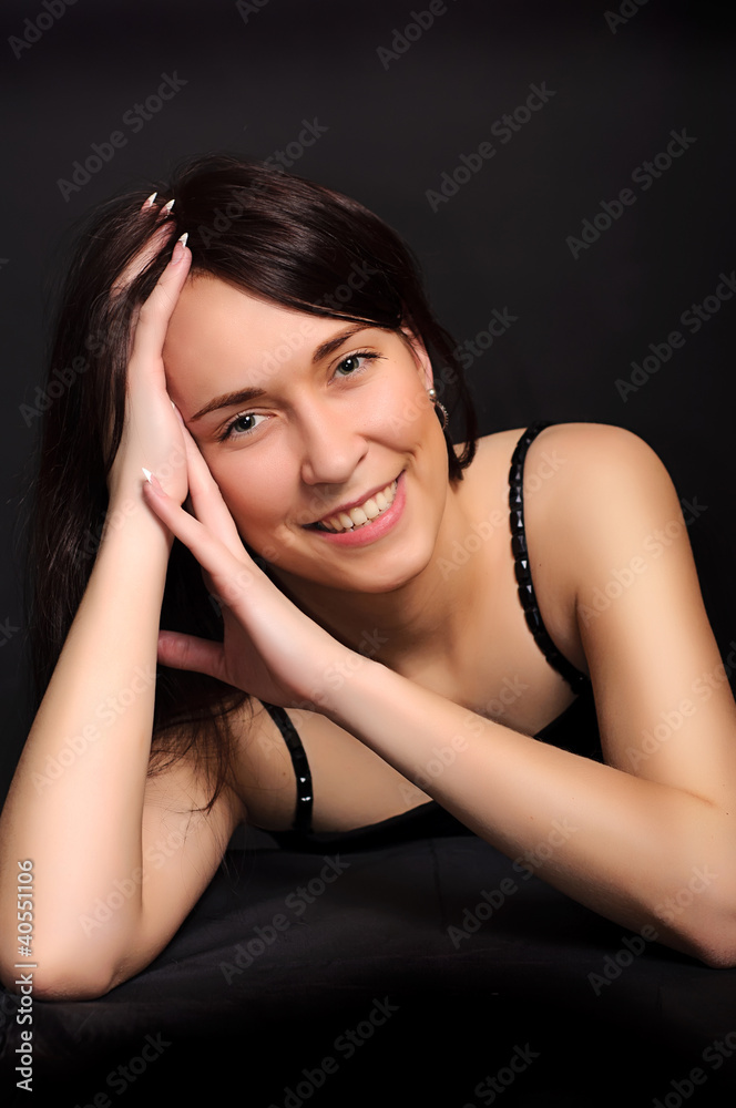 Obraz premium portrait of a young smiling brunette woman