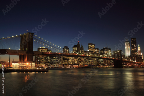 Brooklyn Bridge and Lower Manhattan at twilight.