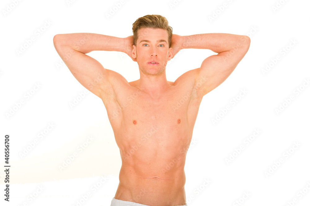 bare-chested man showing muscles