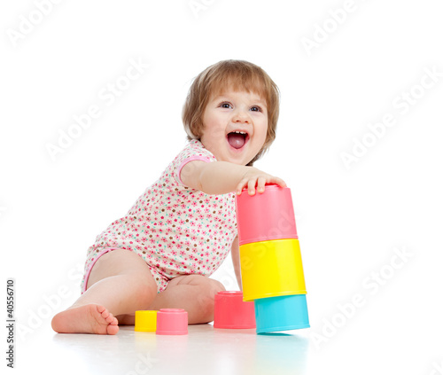 Funny little child playing ...