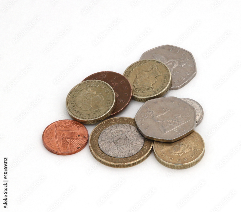 British (uk) currency against a plain white background. British (uk) currency against a plain white background.