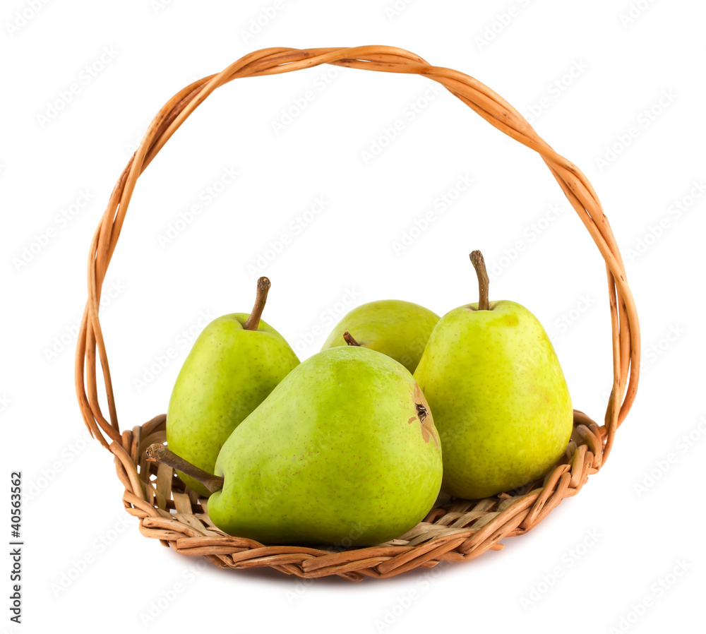 Green ripe pears in wicker basket Green ripe pears in wicker basket
