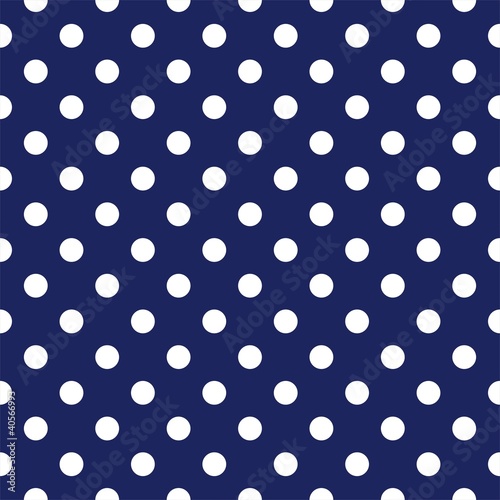 Vector seamless pattern with polka dots on navy background
