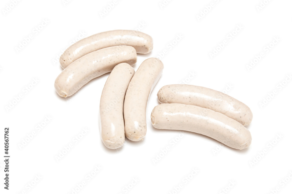German Bratwurst sausages isolated on a white studio background. German Bratwurst sausages isolated on a white studio background.