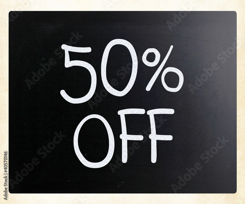 "50% off" handwritten with white chalk on a blackboard