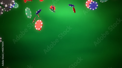 Casino color chips dropping slope green background