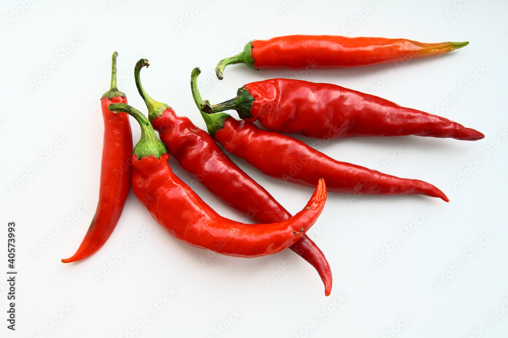 Red hot peppers on white background