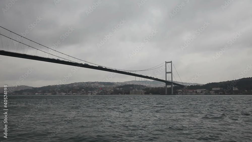 time lapse cargo ship passing under bosphorus bridge time lapse cargo ship passing under bosphorus bridge