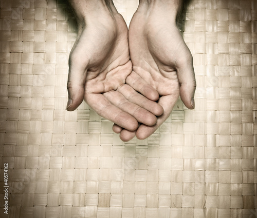 Image of hands asking for beg