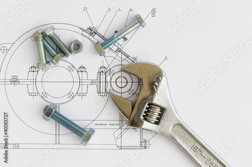 Tools on the background of technical drawings