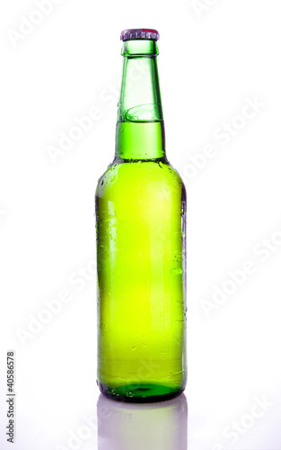 Beer Green Bottle with Condensation on a white background