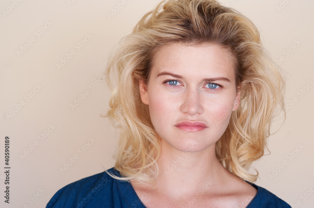 Portrait of beautiful blond young woman