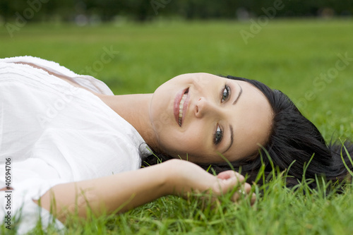 Woman laying on grass