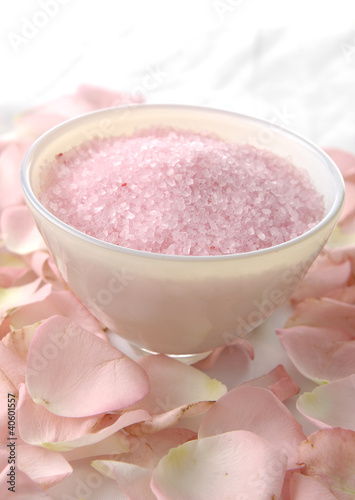 bath salts in bowl with rose petals