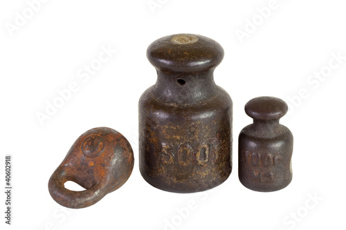 Three of the old weights for scales