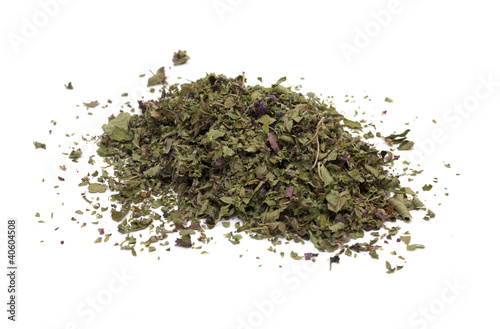dried oregano leaves on a white background
