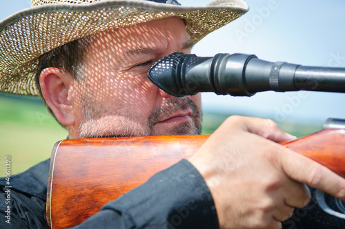 Wall Mural adult hunter aiming