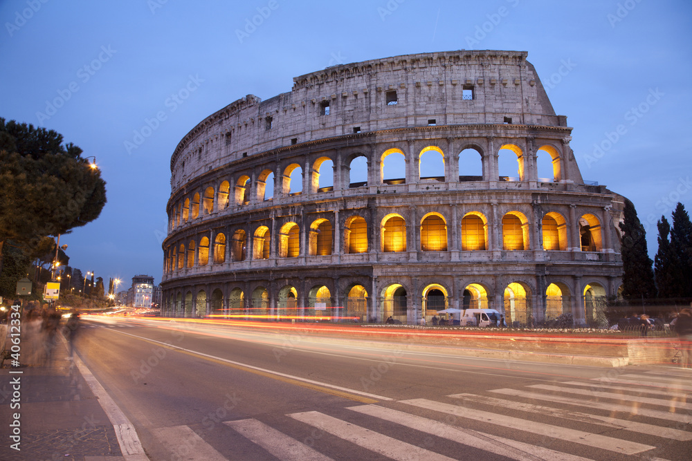 Rome - colosseum in evening and the road