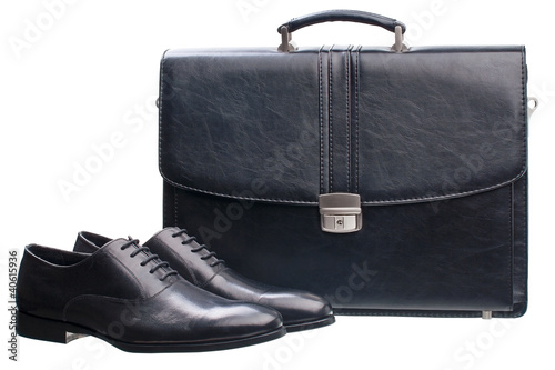 Pair of black men shoes and briefcase over white