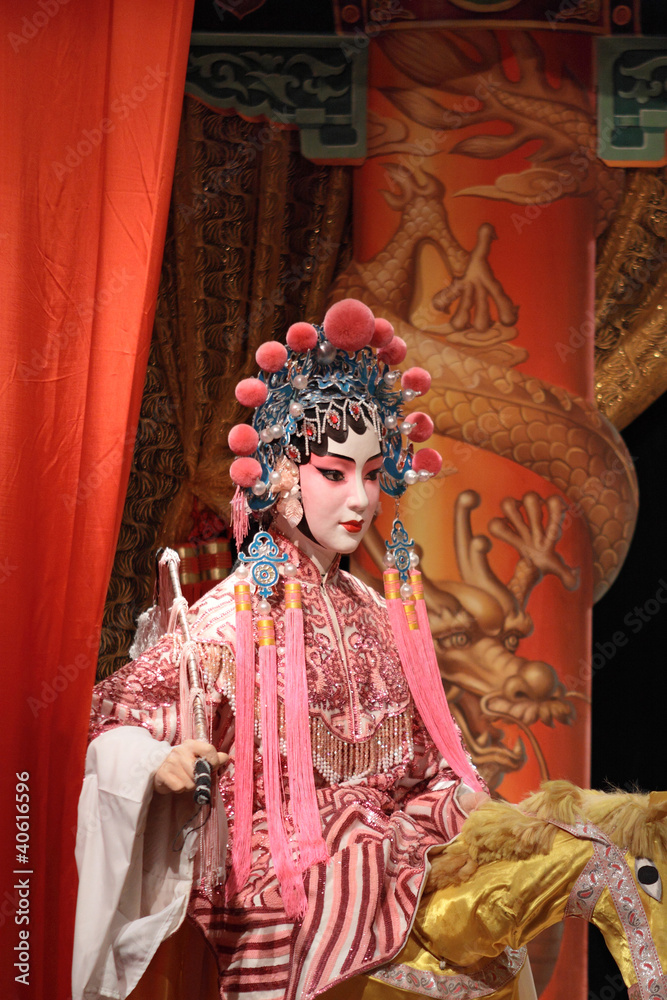 chinese opera dummy and red cloth as text space ,it is a toy,not