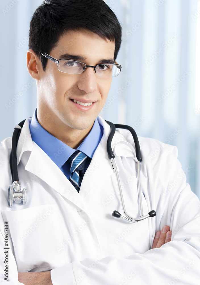 Portrait of happy doctor at office Portrait of happy doctor at office