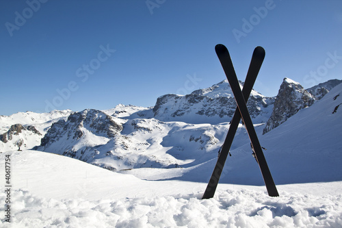 Pair of cross skis in snow photo