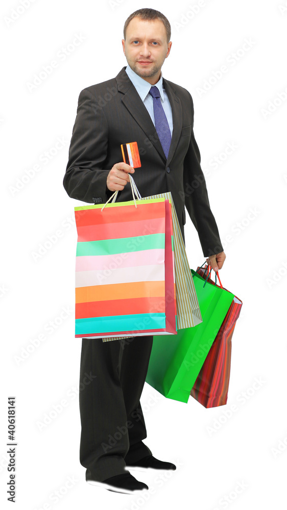 Happy shopping man. Isolated over white background Happy shopping man. Isolated over white background