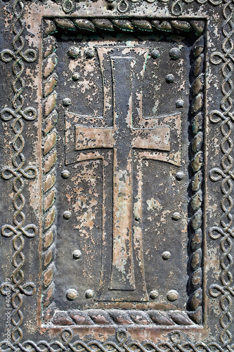 Cross on the old church door