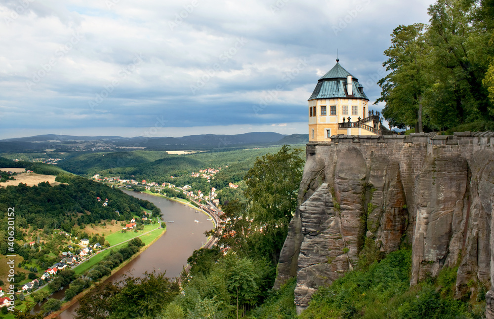 The castle on a rock over a river valley