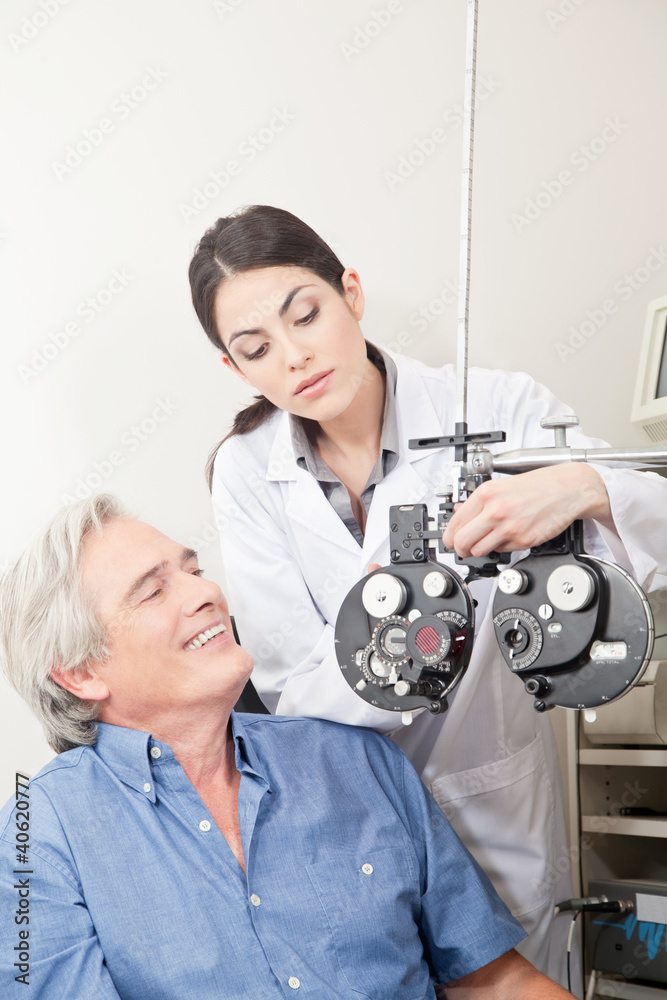 Optometrist doing Sight Testing Optometrist doing Sight Testing