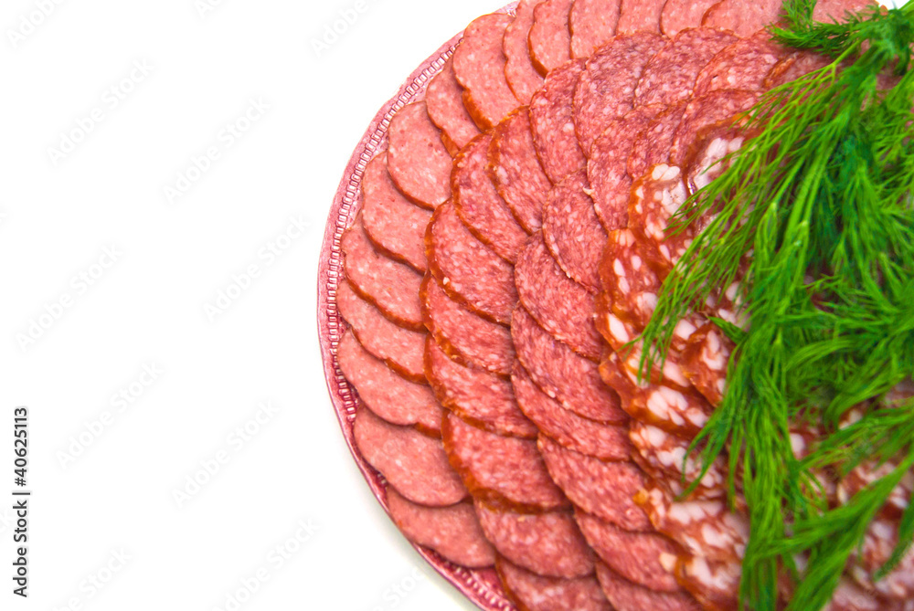 sausage with herbs on plate on white