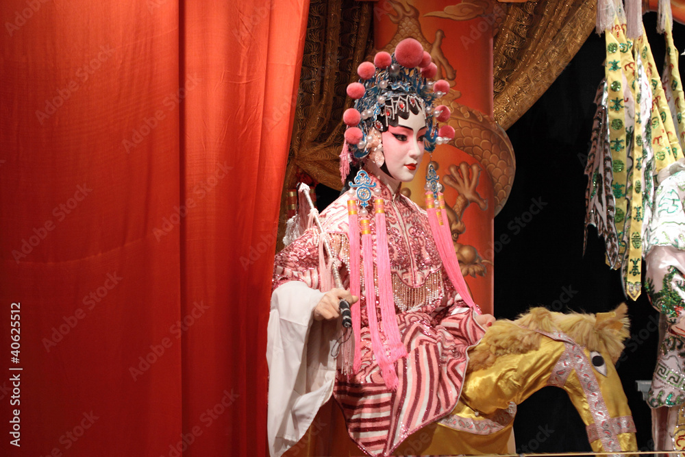 chinese opera dummy and red cloth as text space ,it is a toy,not