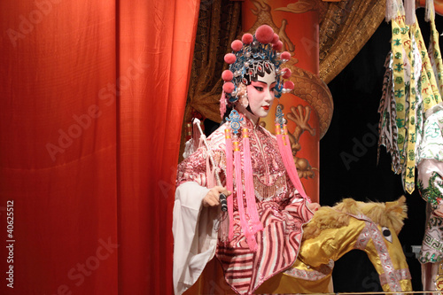 chinese opera dummy and red cloth as text space ,it is a toy,not © Cozyta