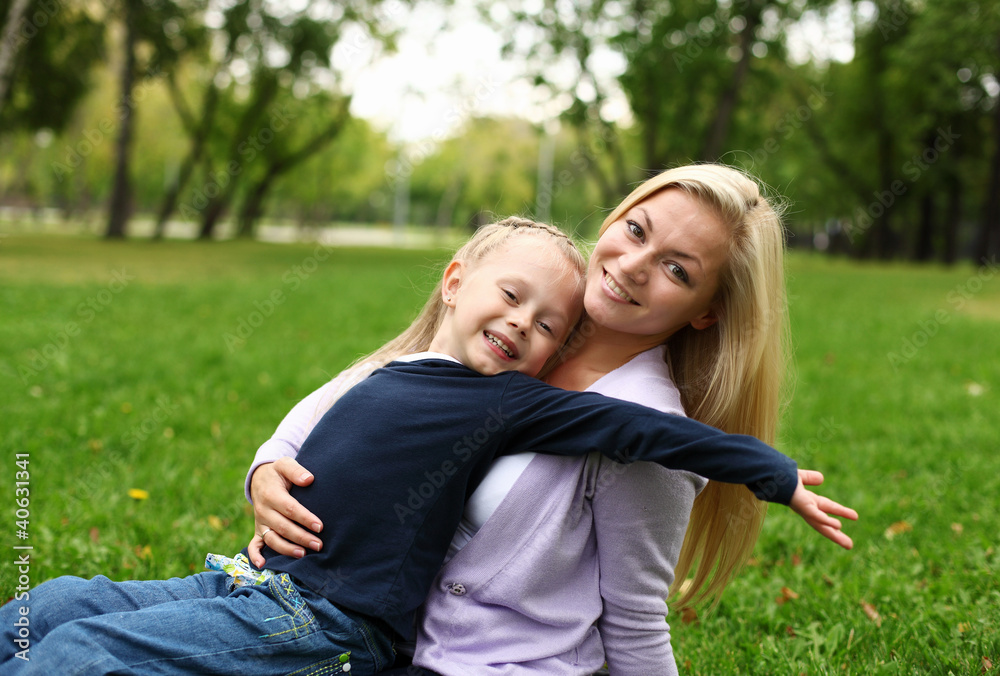 Mother and daughter in park Mother and daughter in park