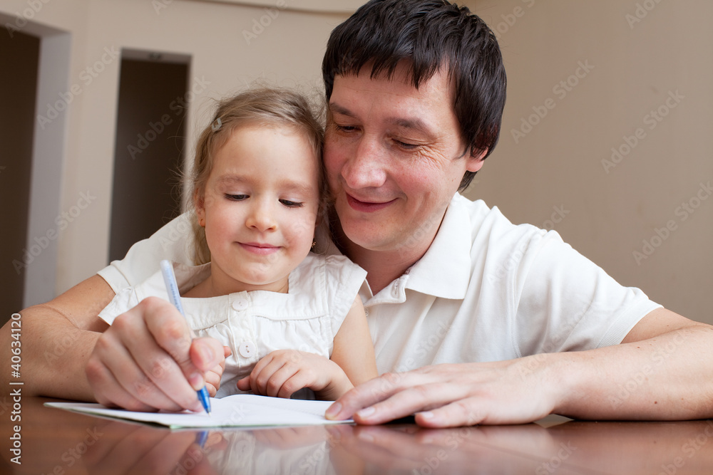 Father helping daughter