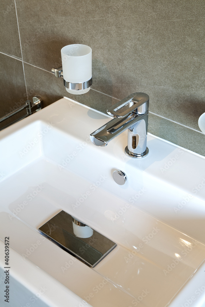 Fototapeta premium modern bathroom sink in white ceramic