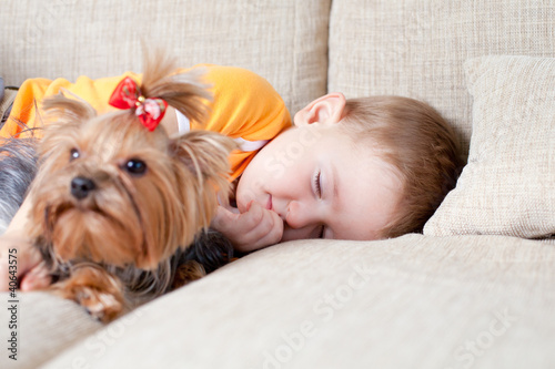 little boy sleeping and hug...