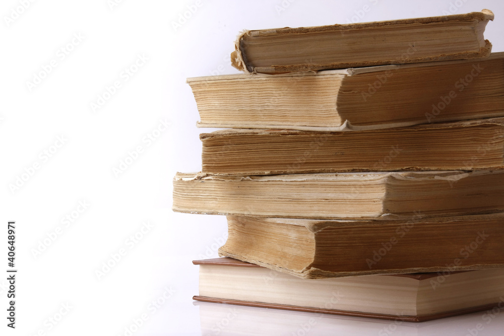 Fototapeta premium A pile of books isolated on white background