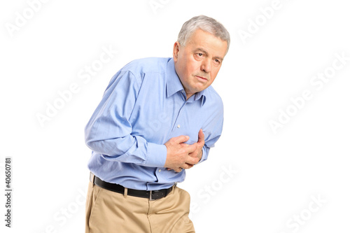 A senior man having a heart attack