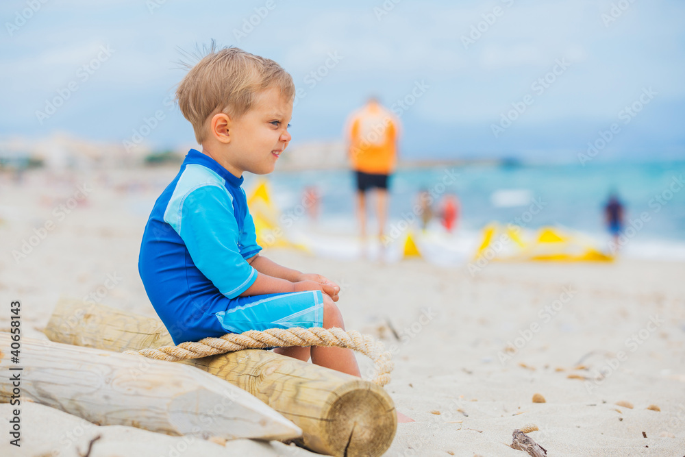 Boy on beach vacation