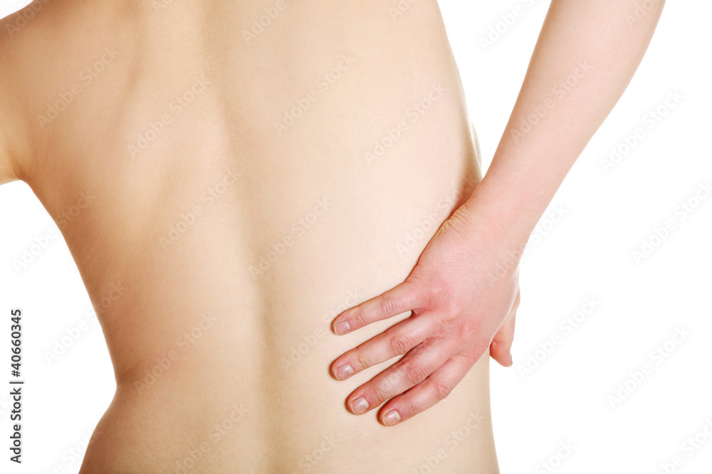 Young woman with pain in her back