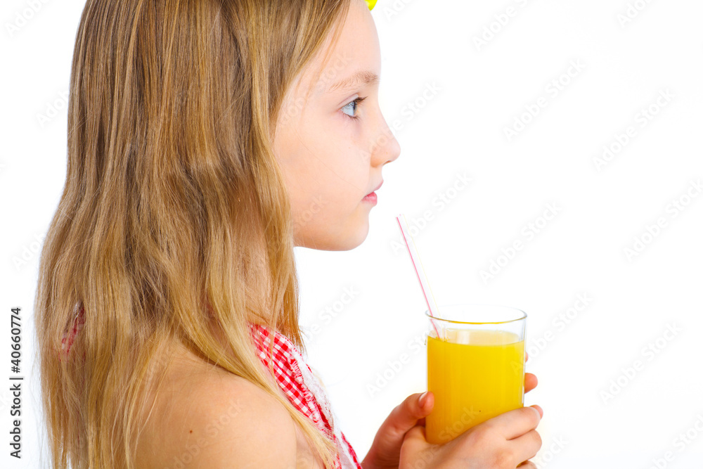 Portrait of little girl drinking orange juice Portrait of little girl drinking orange juice