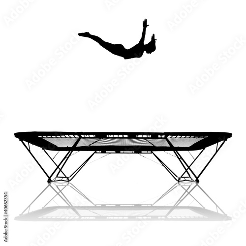 silhouette of gymnast jumping on trampoline