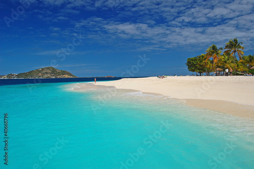 Azure clear water of beautiful Palm Island beach