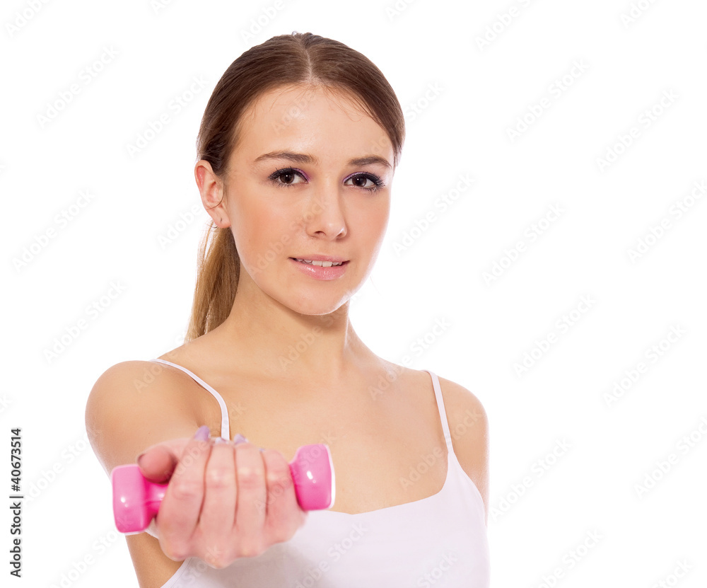 Young fitness woman exercising isolated on white Young fitness woman exercising isolated on white